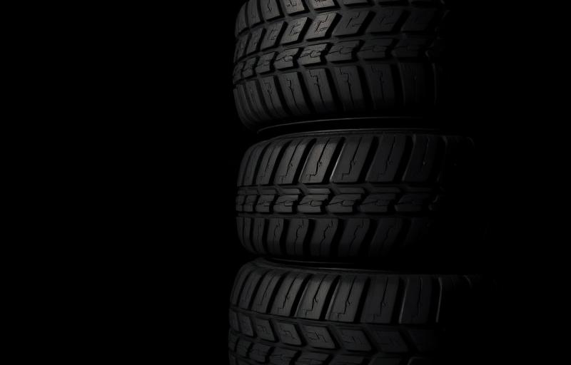 Stack of new tyres at Global Tyres Scot
